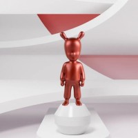 The metallic red Guest Figurine. Small Model