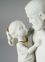 In Daddy's Arms Figurine. White & Gold