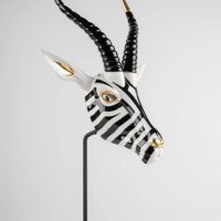 Antelope mask. Black and gold