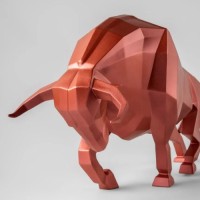 Bull Sculpture. Metallic red